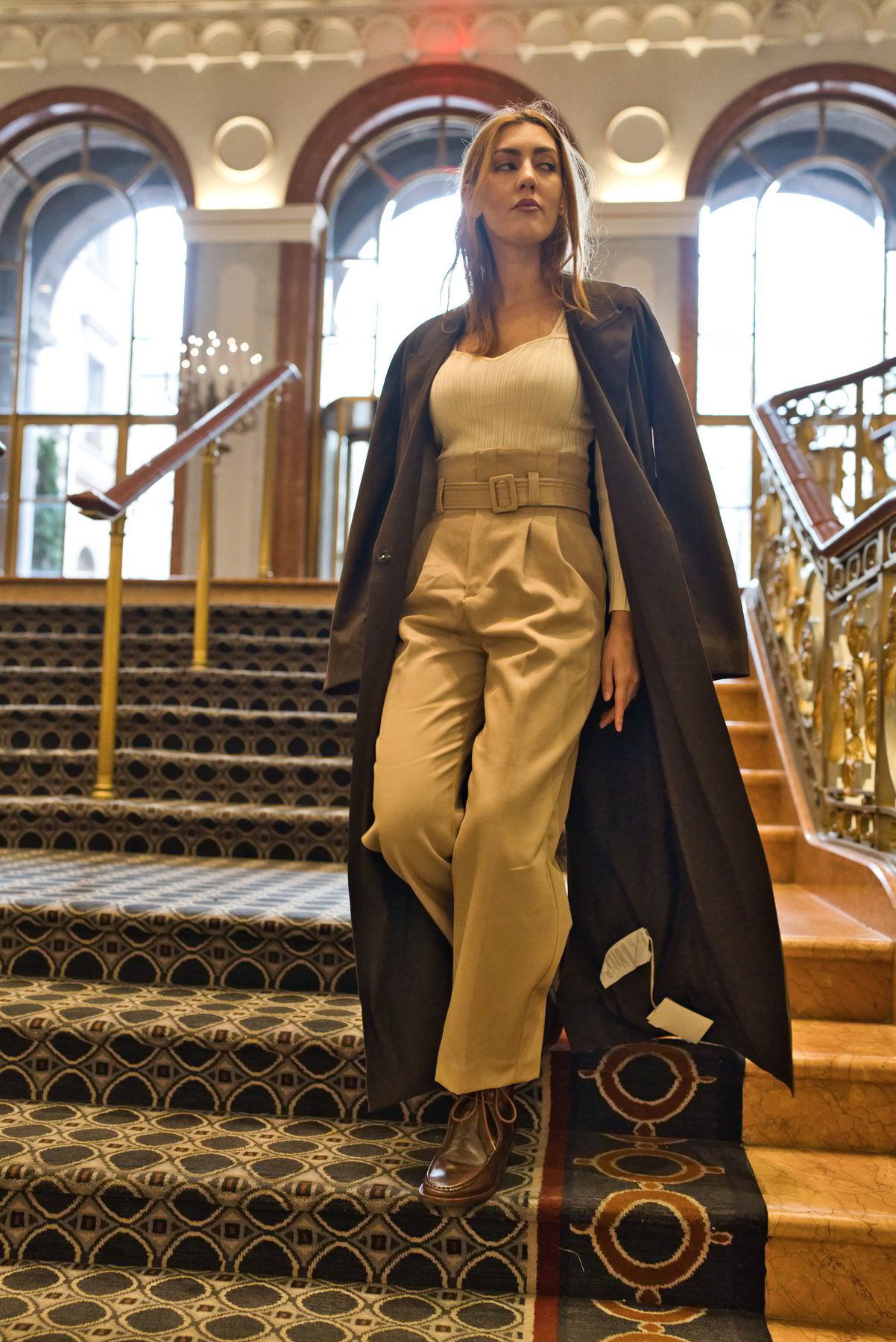 Long coat on the staircase